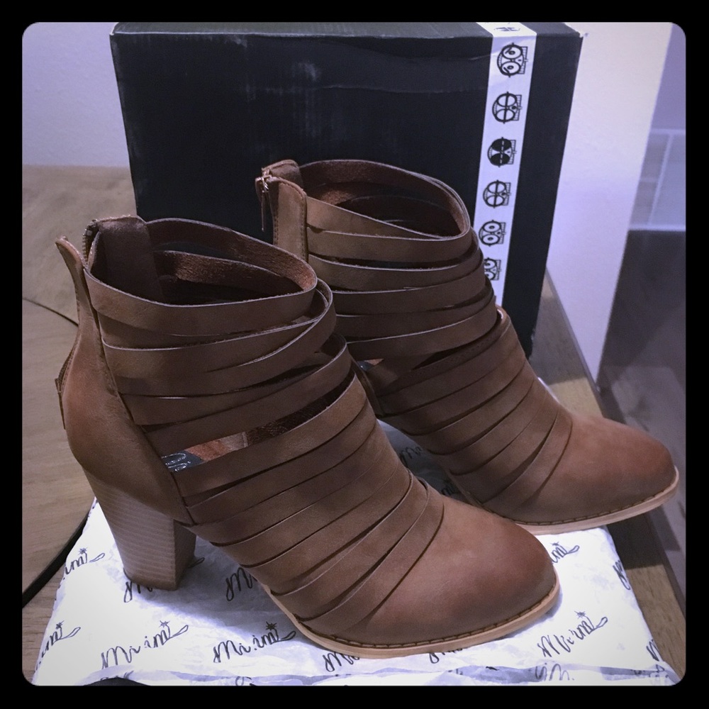 Strappy high heel bootie